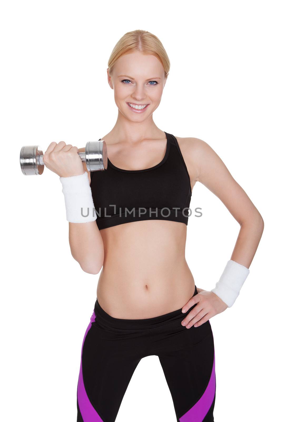Beautiful young fitness woman doing weight training. Isolated on white