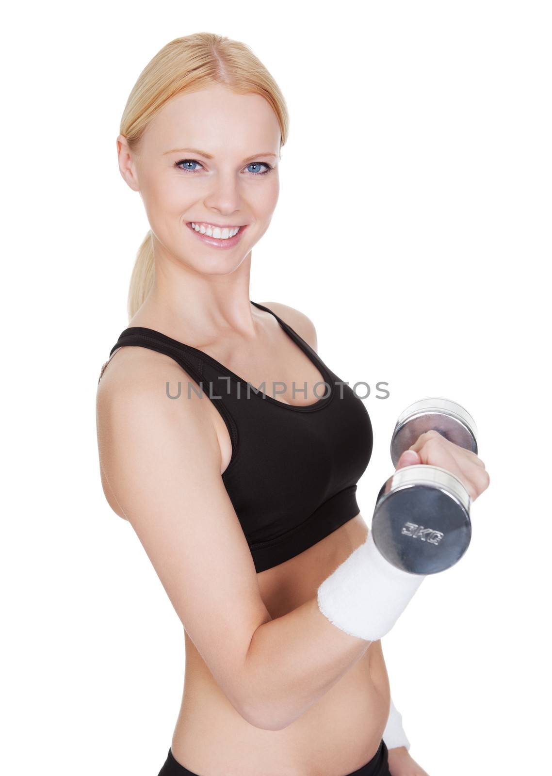 Beautiful young fitness woman doing weight training. Isolated on white