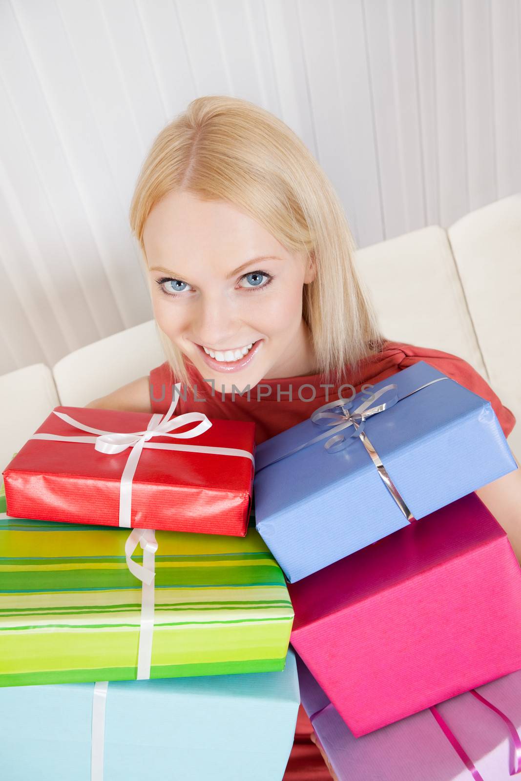 Beautiful young woman with her presents by AndreyPopov