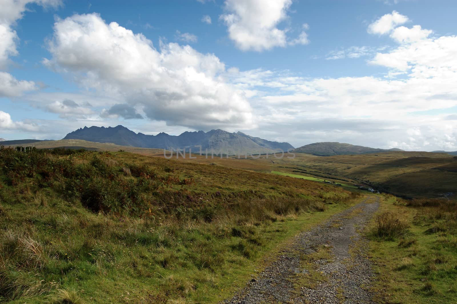 The Cuillins of Skye from a viewpoint near Carbostmore on the west coast with an old road in the foreground