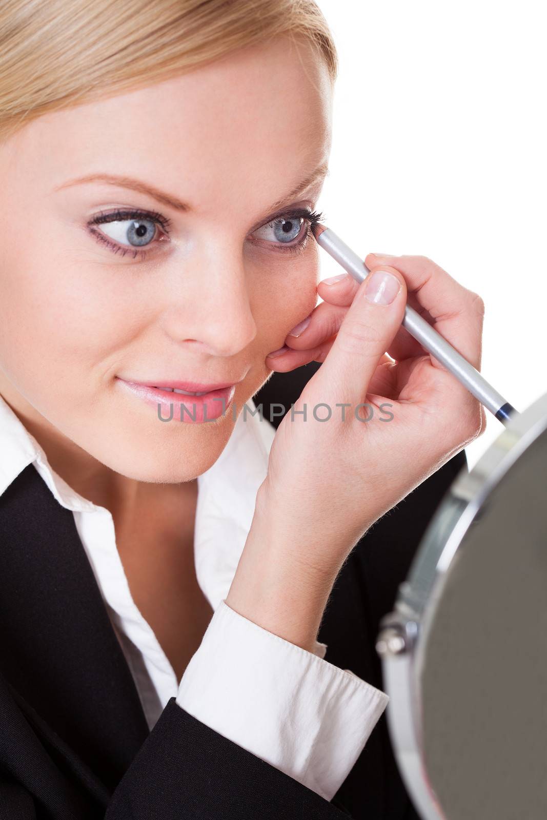 Attractive businesswoman drawing with eyeliner. Isolated on white