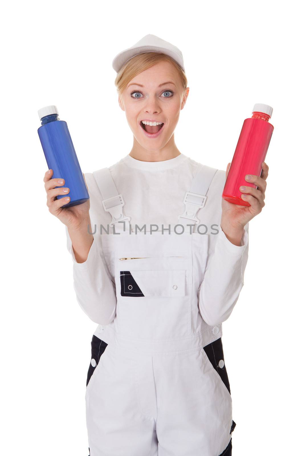 Professional young painter woman holding two buckets of paint. Isolated on white