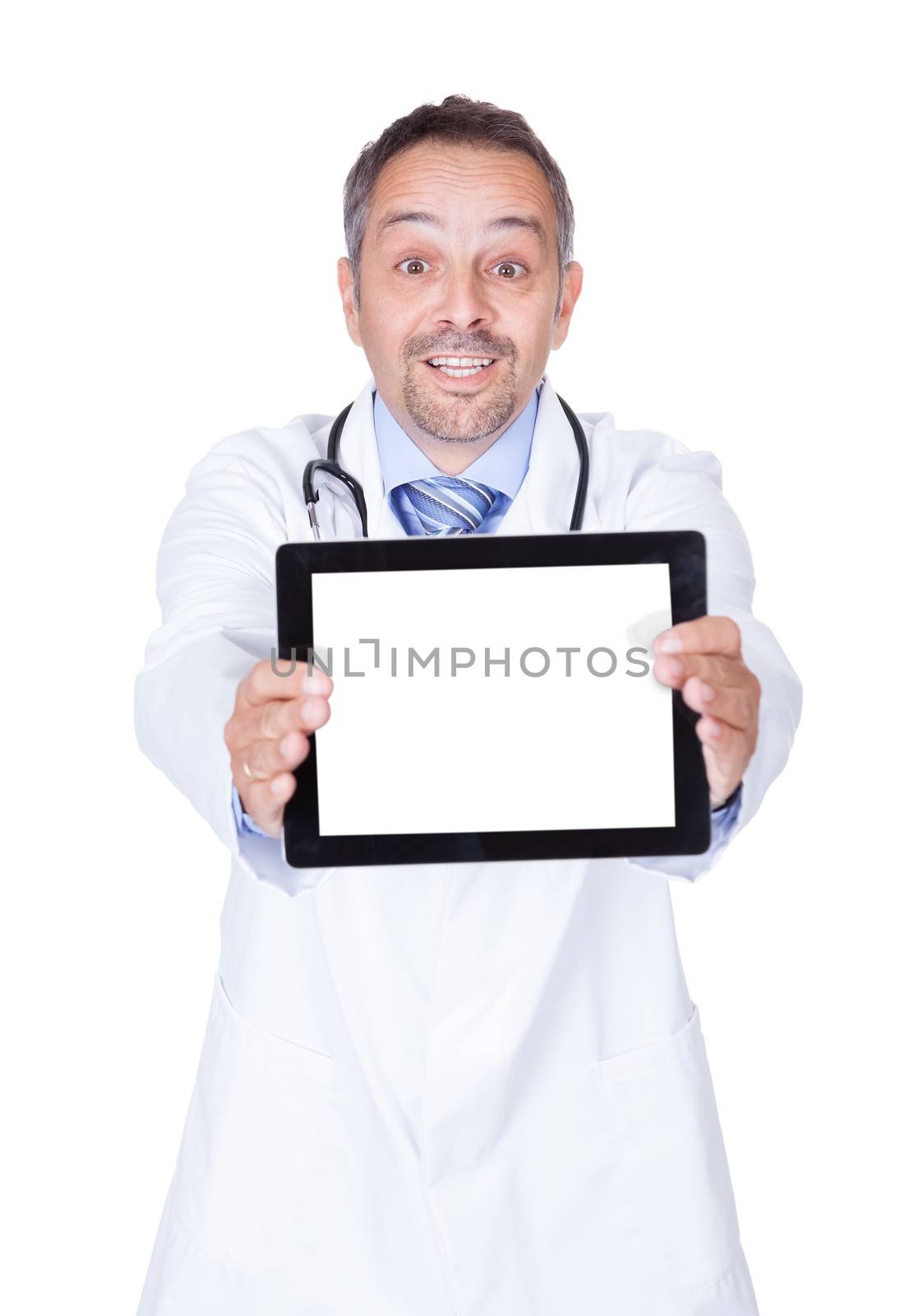 Happy Doctor Holding Blank Digital Tablet by AndreyPopov