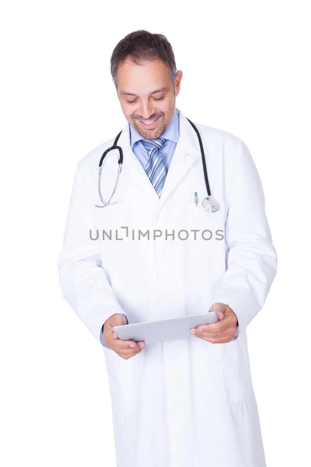 Portrait Of A Confident Doctor With Tablet Isolated On White Background
