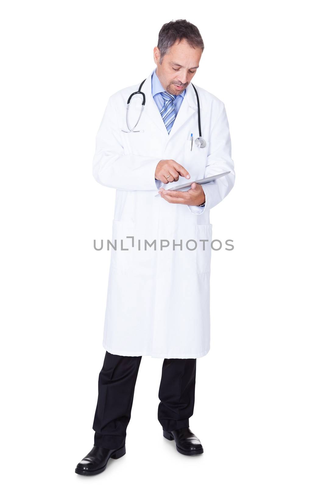 Portrait Of A Confident Doctor With Tablet Isolated On White Background