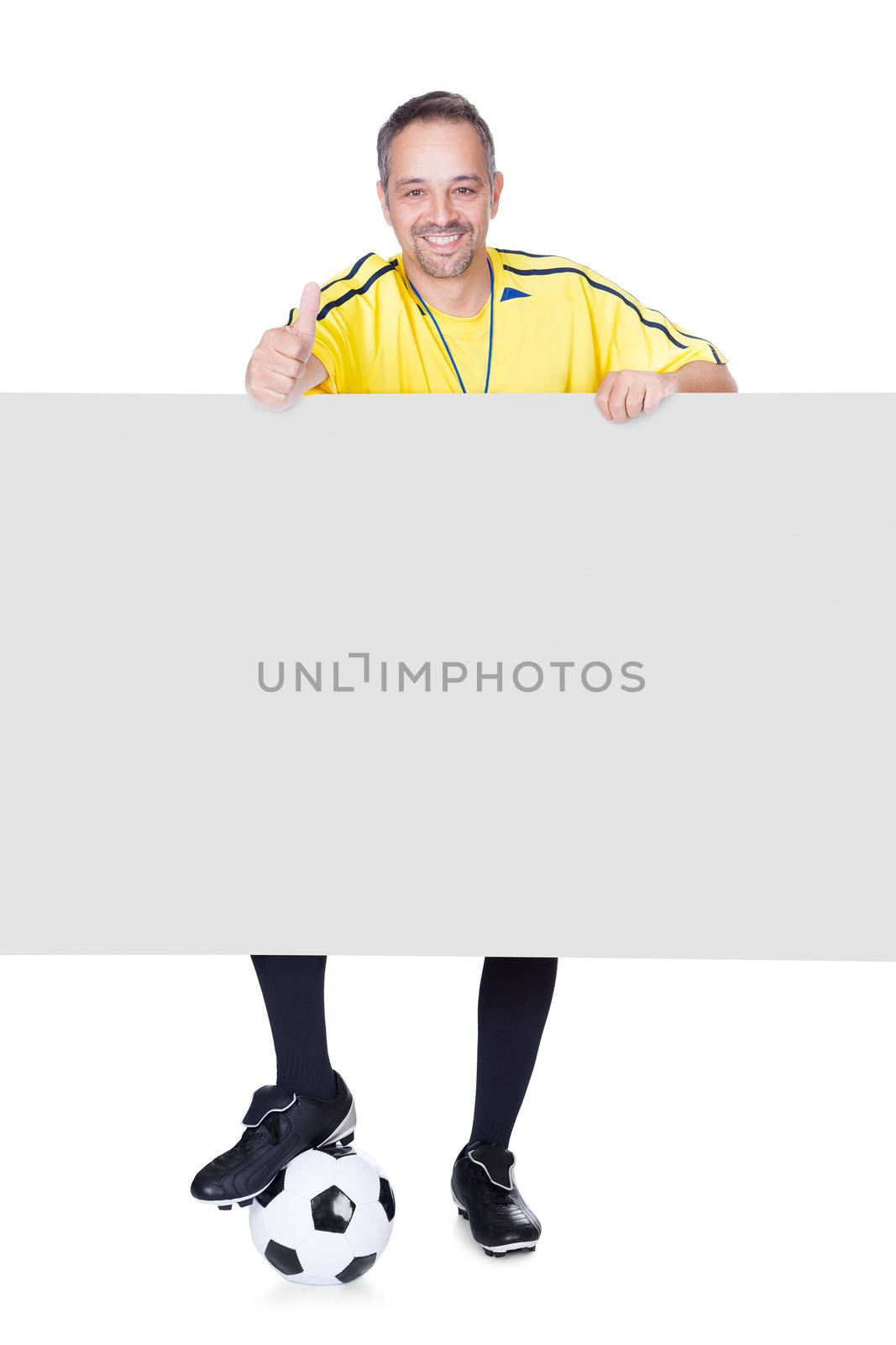 Portrait Of Happy Coach Holding Placard And Football Isolated On White Background