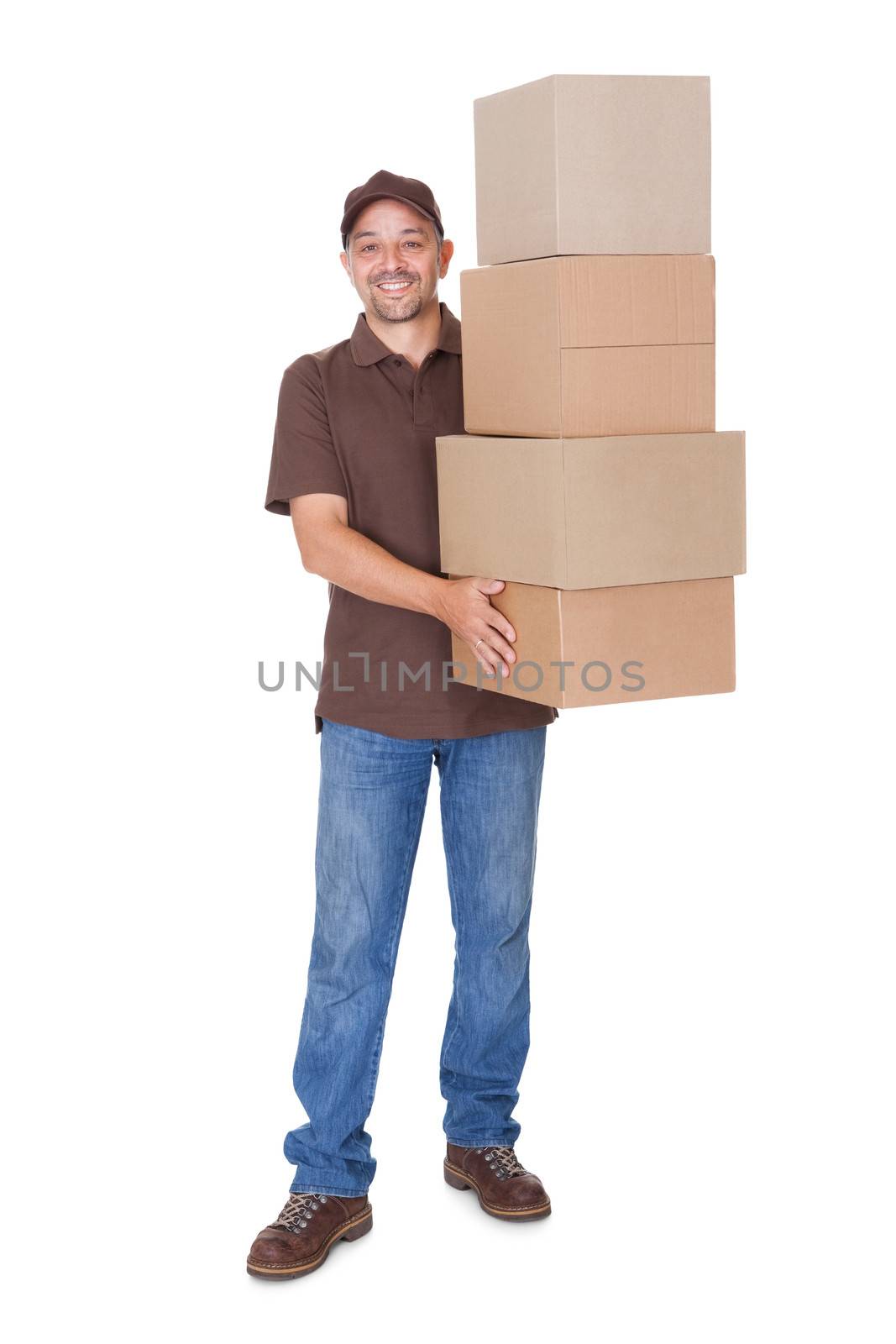 Happy Man Holding Stack Of Cardboxes On White Background