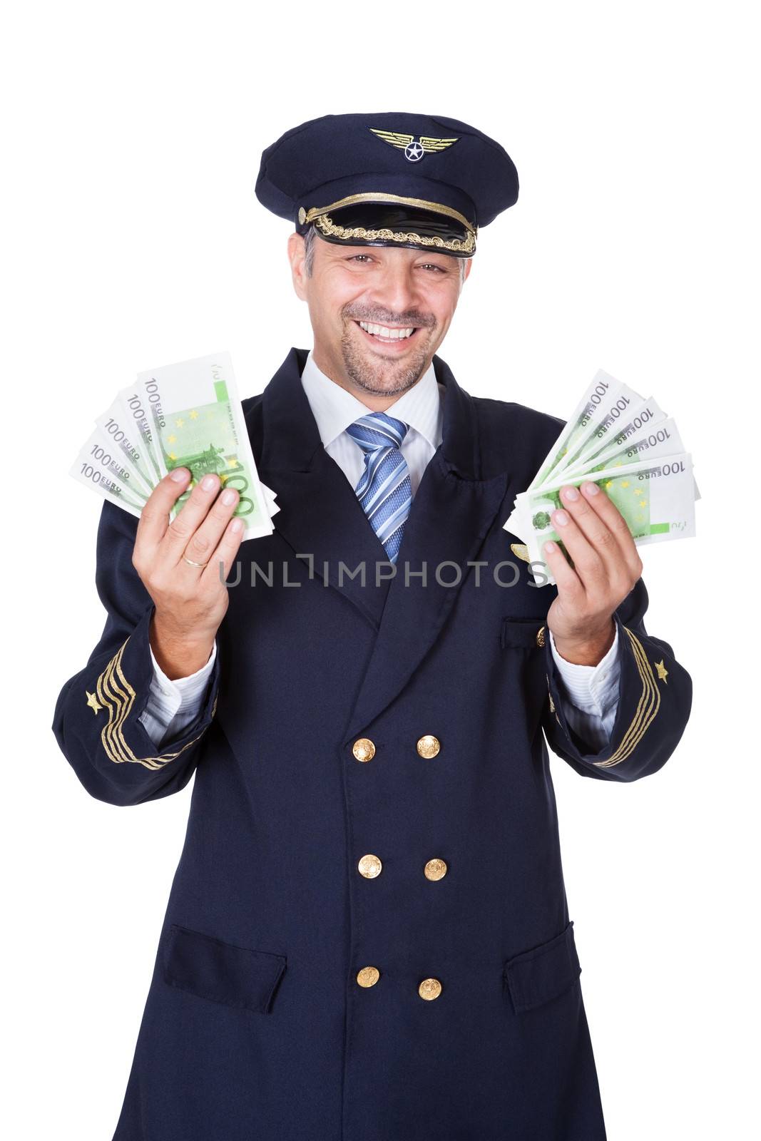 Portrait Of Happy Pilot Holding Euros by AndreyPopov