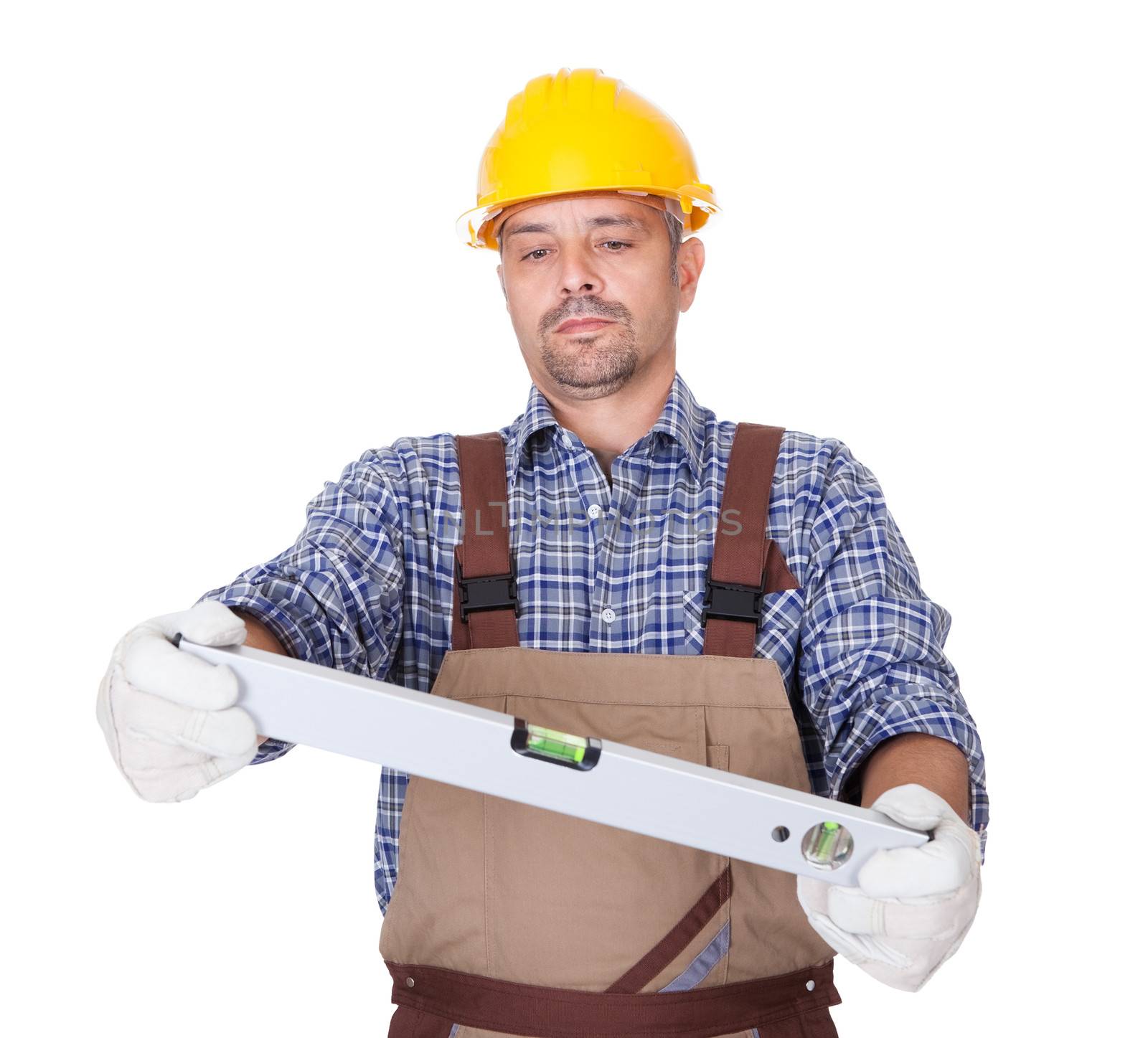 Portrait Of Technician Looking At Level Isolated On White Background