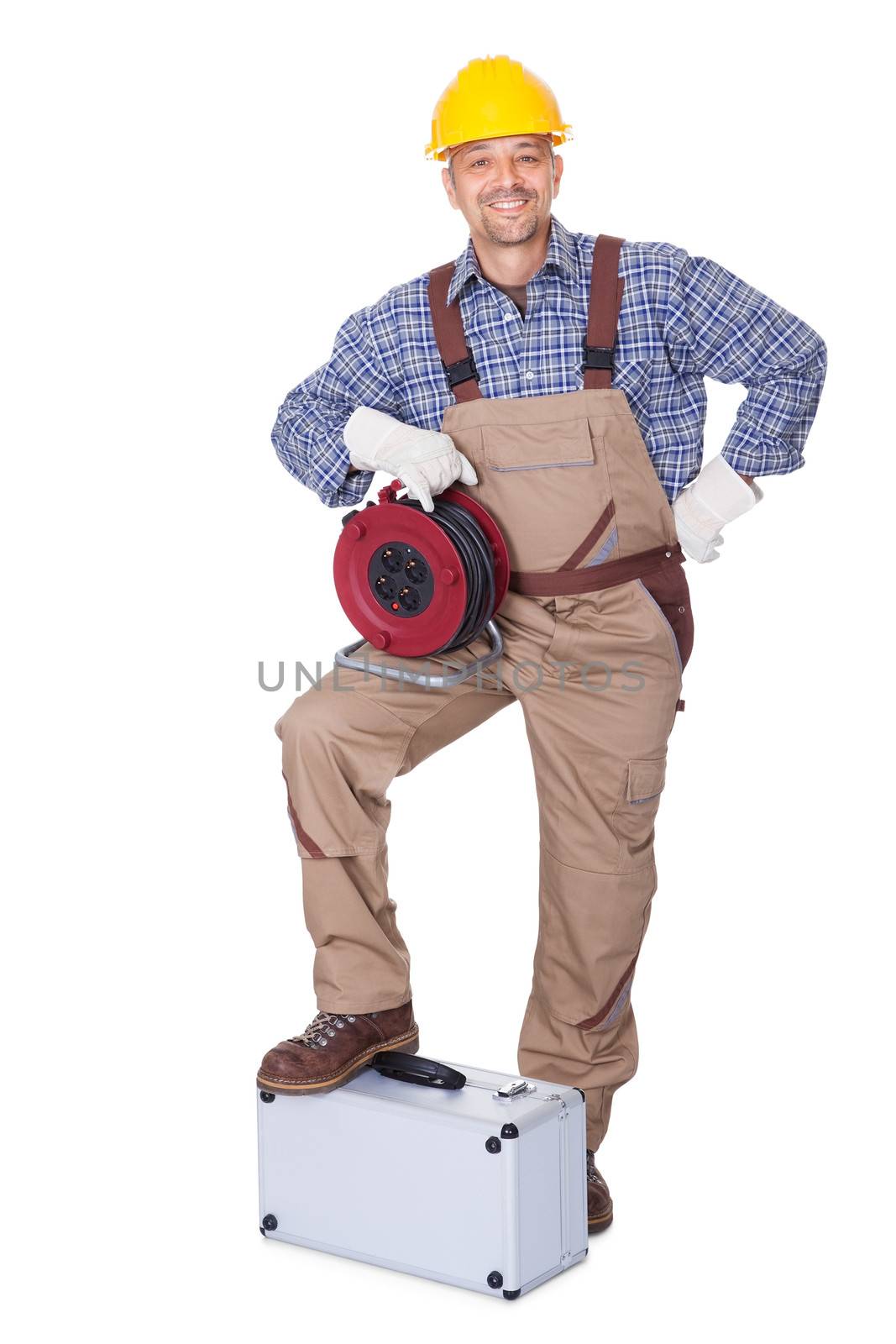 Happy Construction Worker Holding Toolbox And Cable On White Background