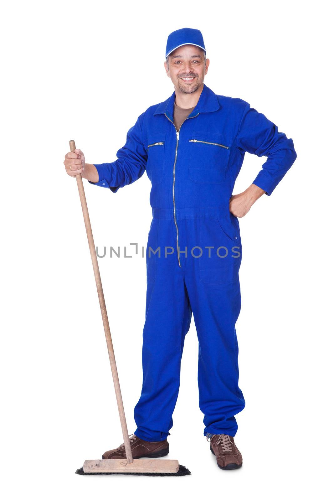 Happy Sweeper Posing With Brush On White Background