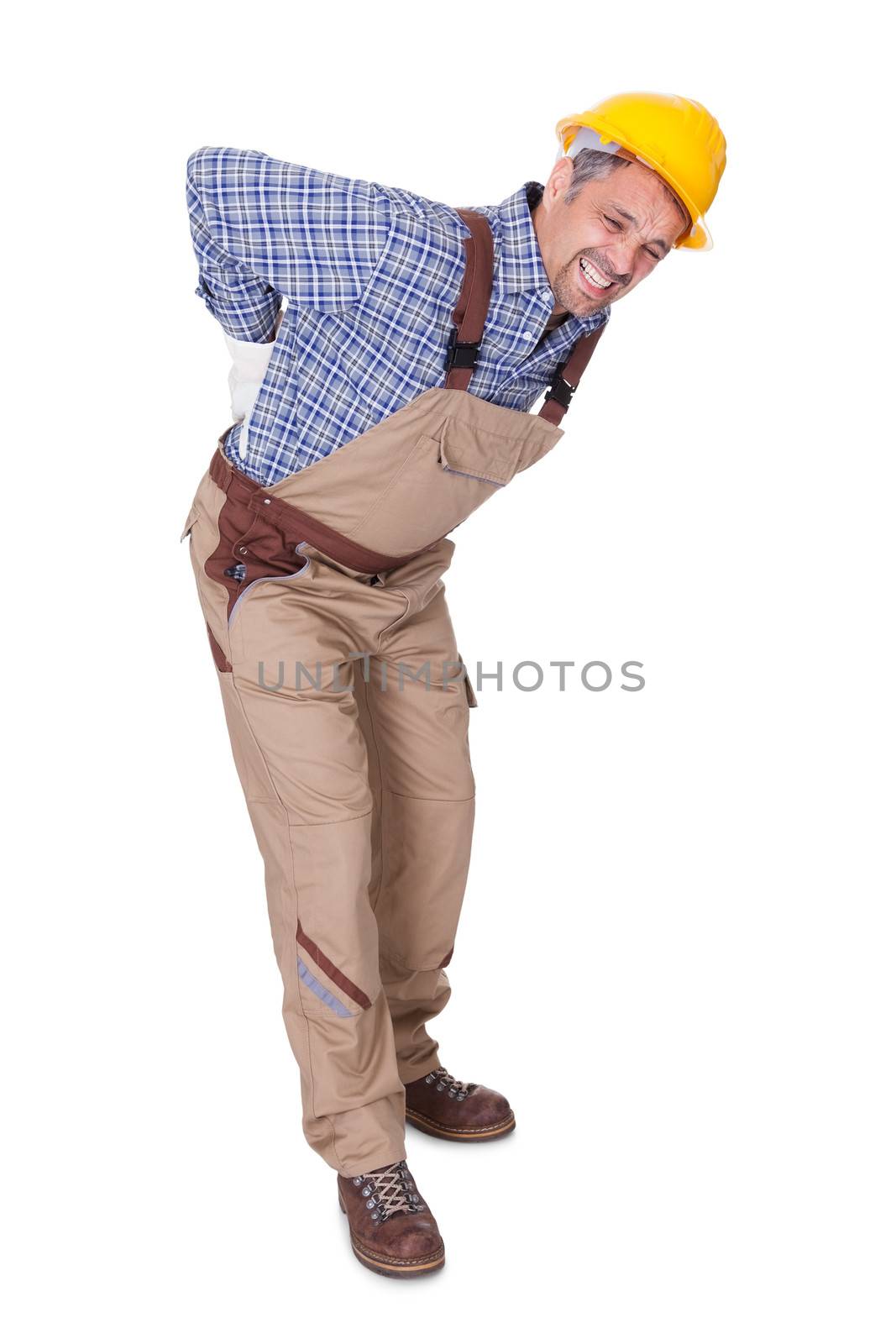 Portrait Of A Worker With Back Pain Isolated On White Background