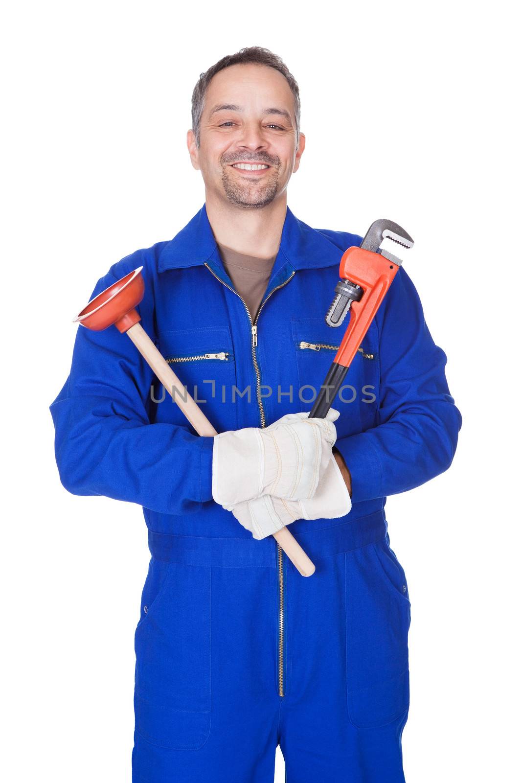 Happy Plumber Holding Plunger And Wrench by AndreyPopov