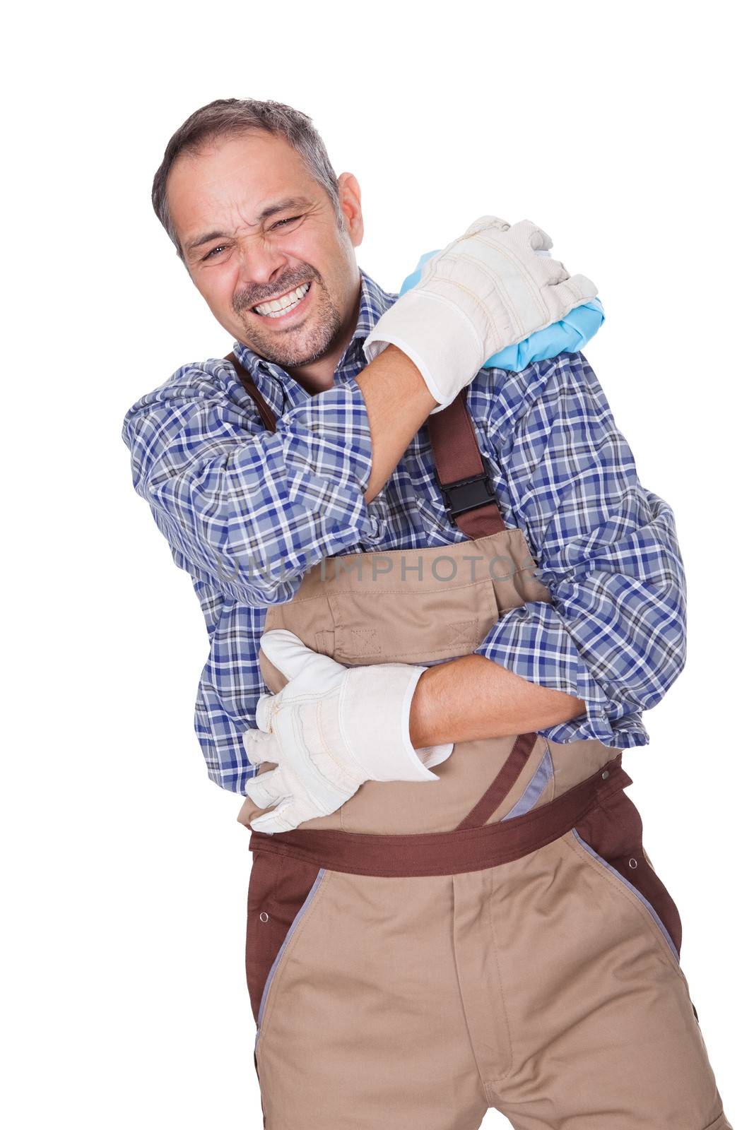 Construction Worker Suffering With Shoulder Pain On White Background