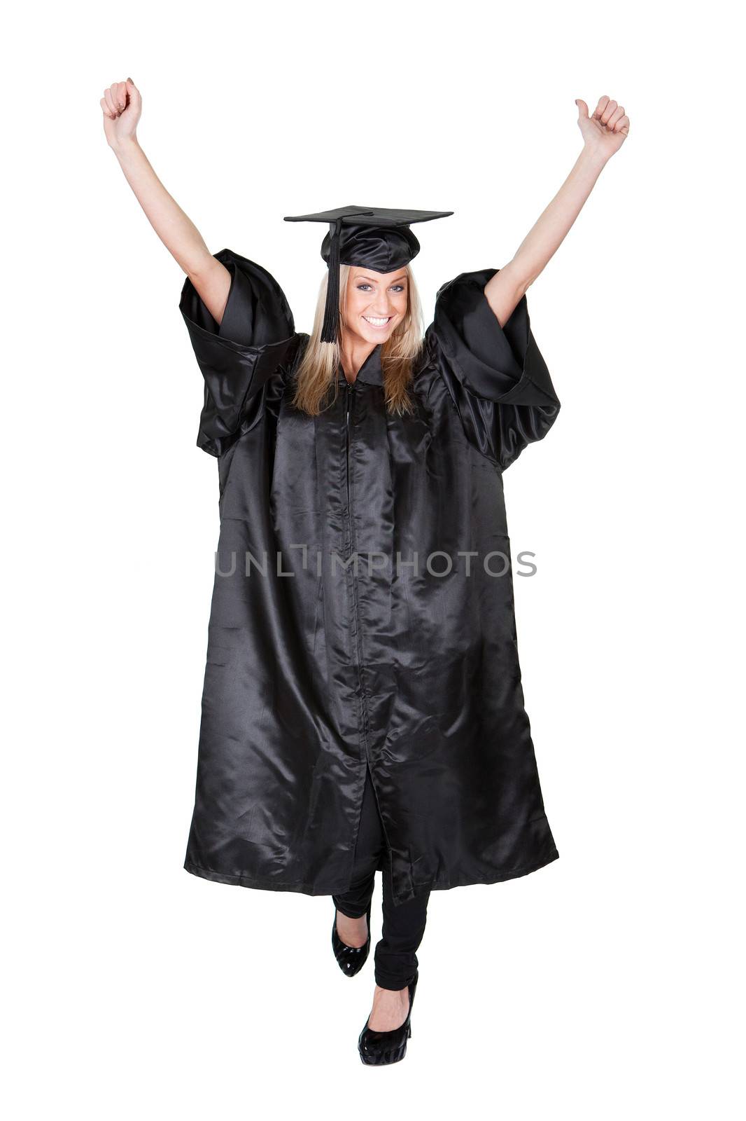 Beautiful female student graduating. Isolated on white