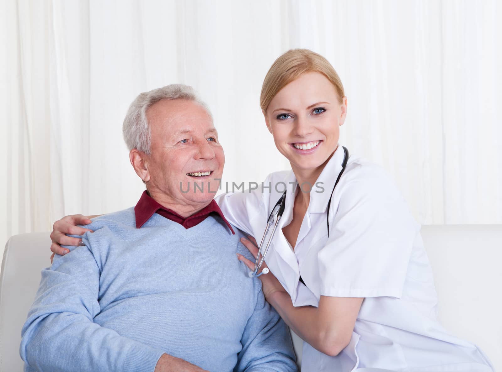 Portrait Of Happy Doctor And Patient; Indoor