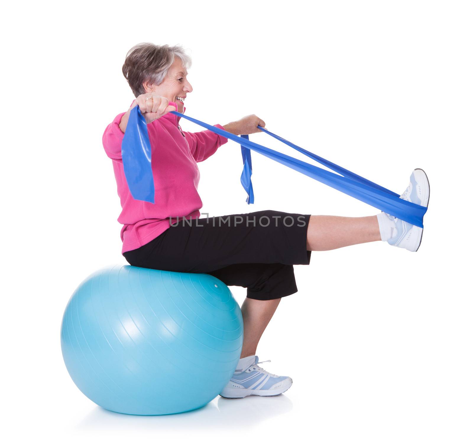 Senior Woman Stretching Exercising Equipment On White Background