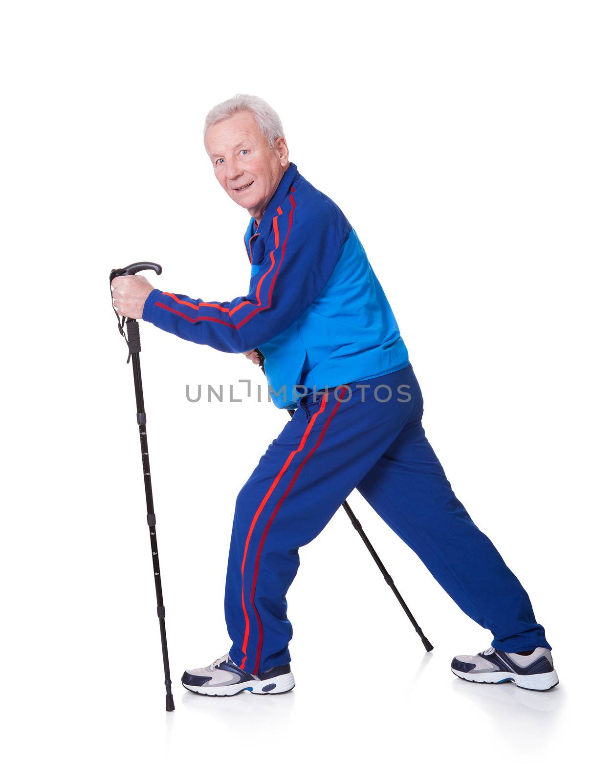 Senior Man Walking With Hiking Poles On White Backgrounds