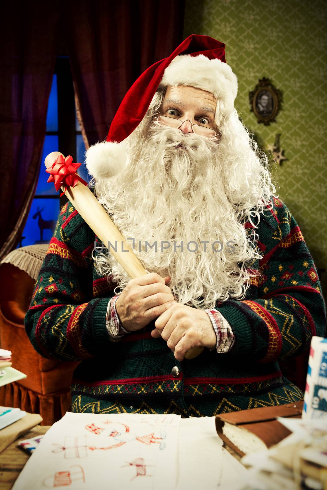 Portrait of a nice Santa Claus with a baseball bat