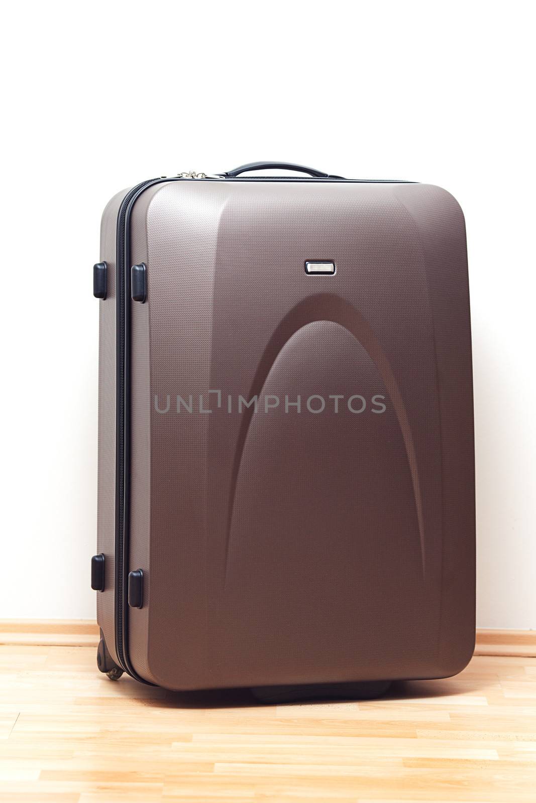 big brown suitcase for travel by jannyjus