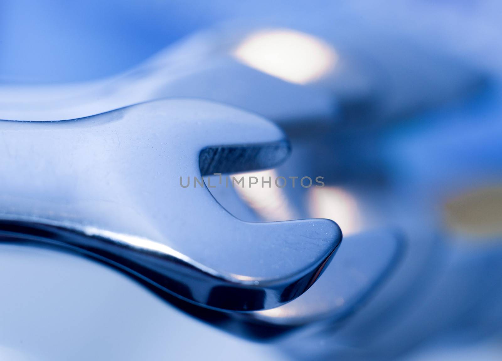 silver chrome plated wrench spanner, close-up