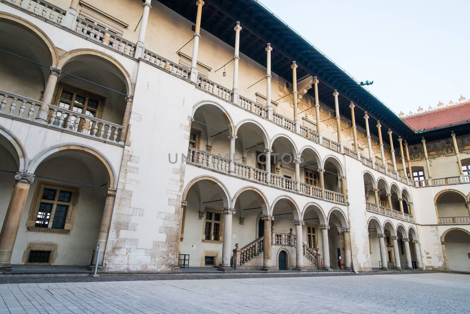 KRAKOW, POLAND - AUGUST 29: inner yard of royal palace in Wawel on August 29, 2013 in Krakow, Poland. The monument to the history of the Decree of the President Lech Walesa on September 8, 1994.