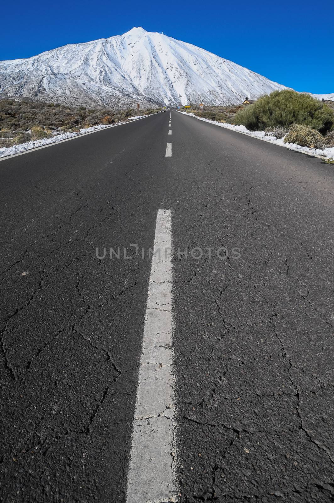 Snow Desert Lonely Road Landscape in Volcan Teide National Park, Tenerife, Canary Island, Spain