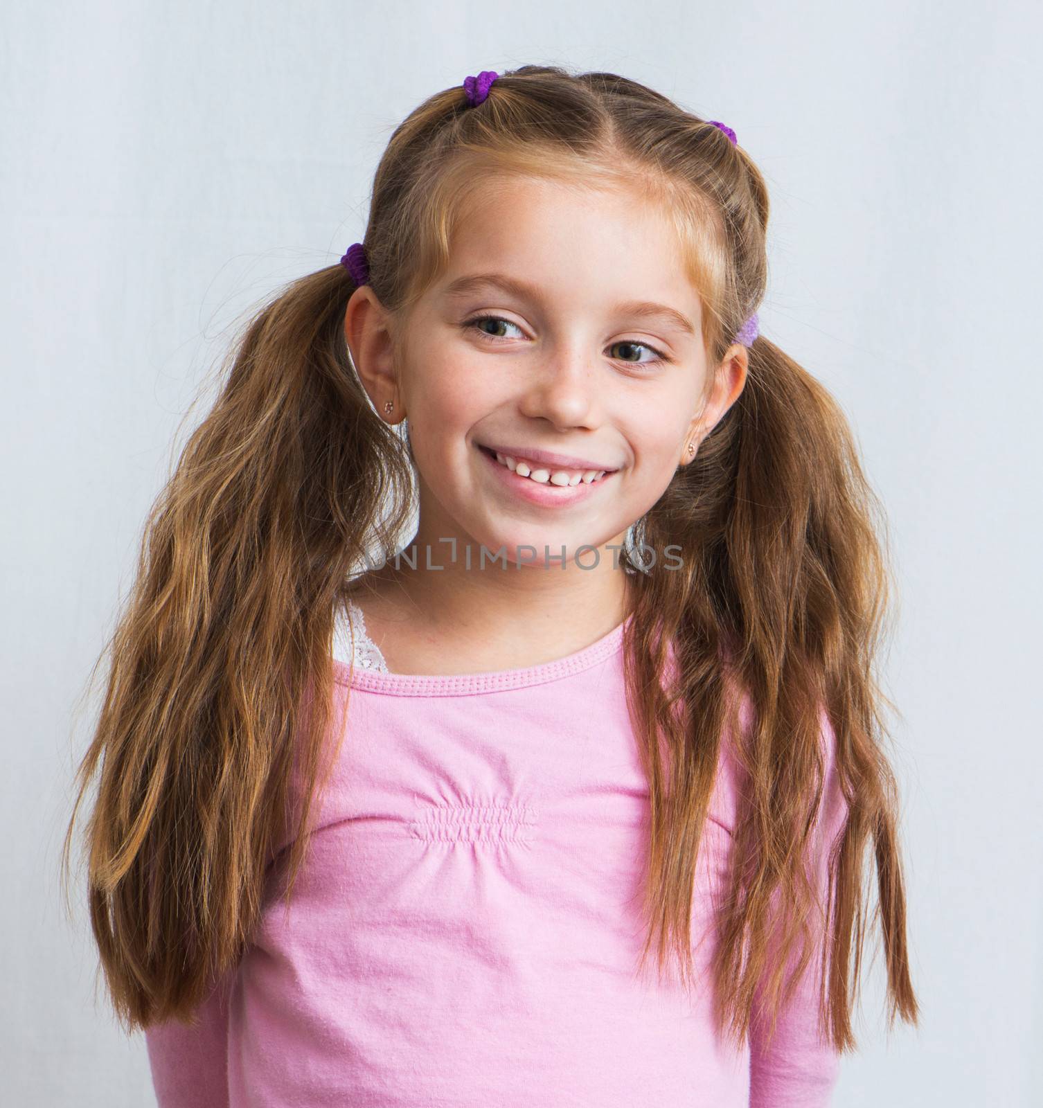 cute little girl smiling portrait close-up