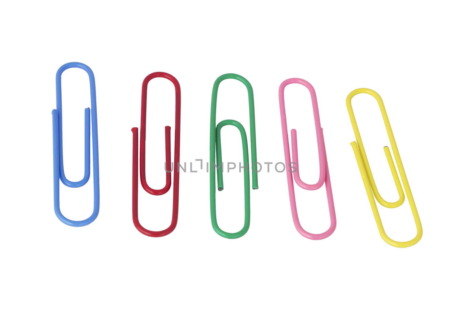 Office paper clips of different colors. Isolated on white background