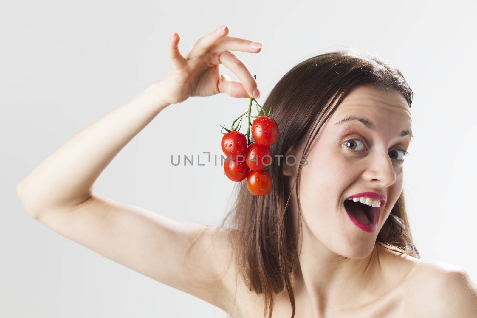 young woman with tomatos