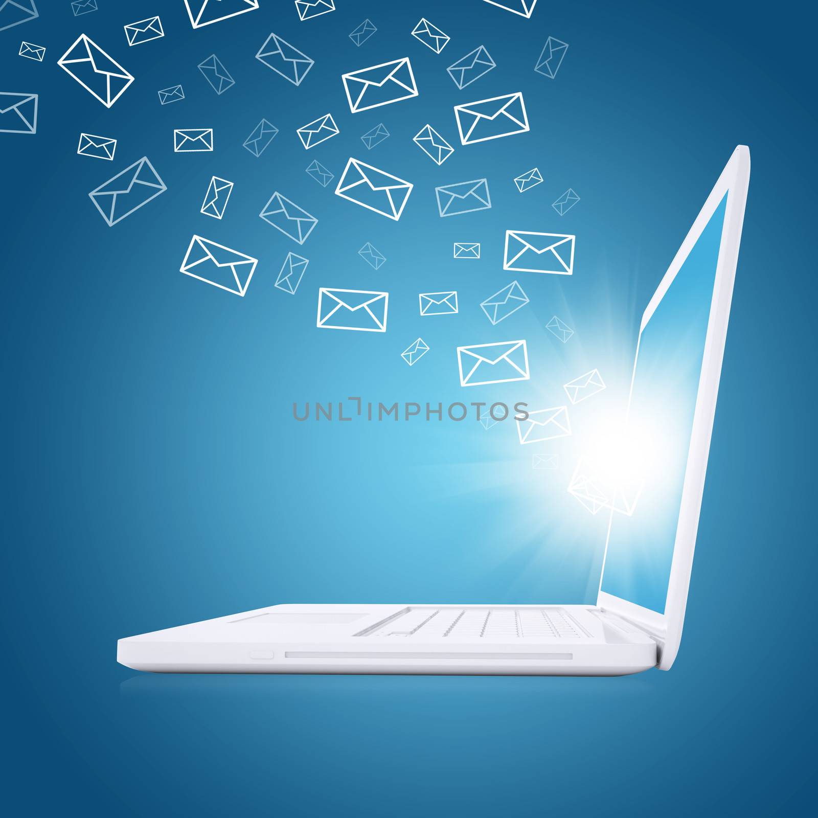 Emails fly out of laptop screen. The concept of e-mailing