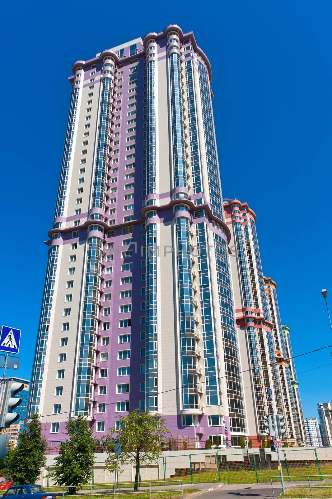 Beautiful view of modern apartment buildings under blue sky