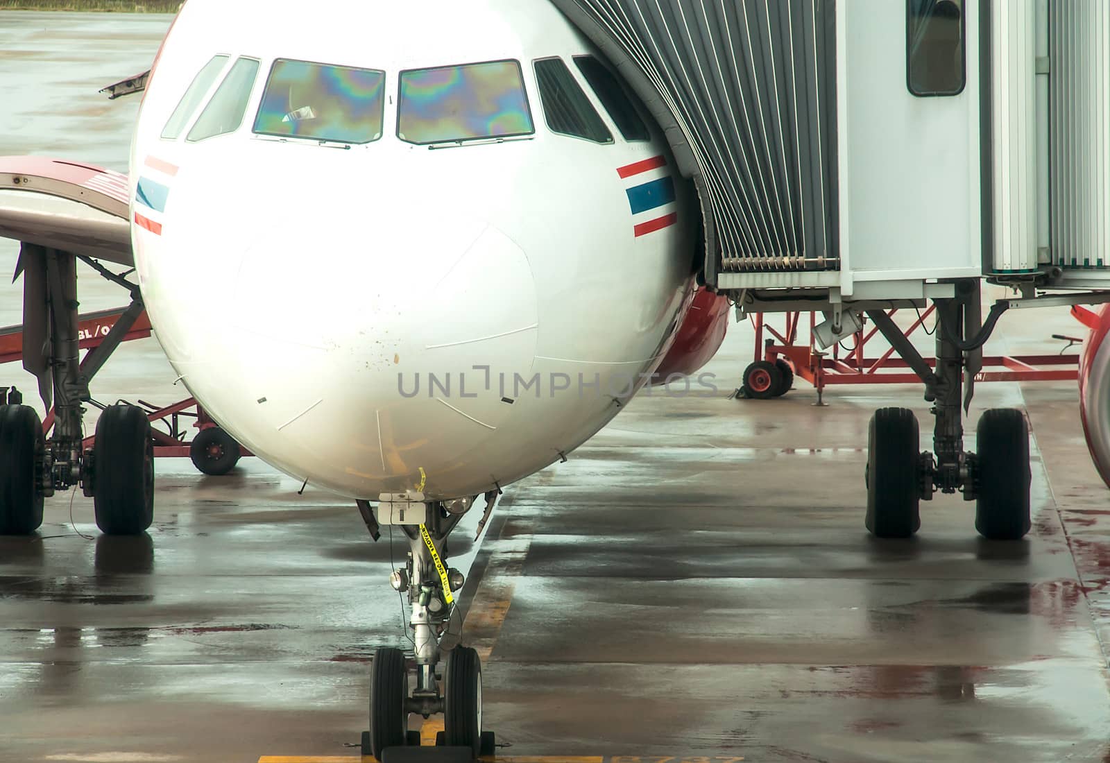 aerobridge in plane parked at Udon Thani Airport  in thailand