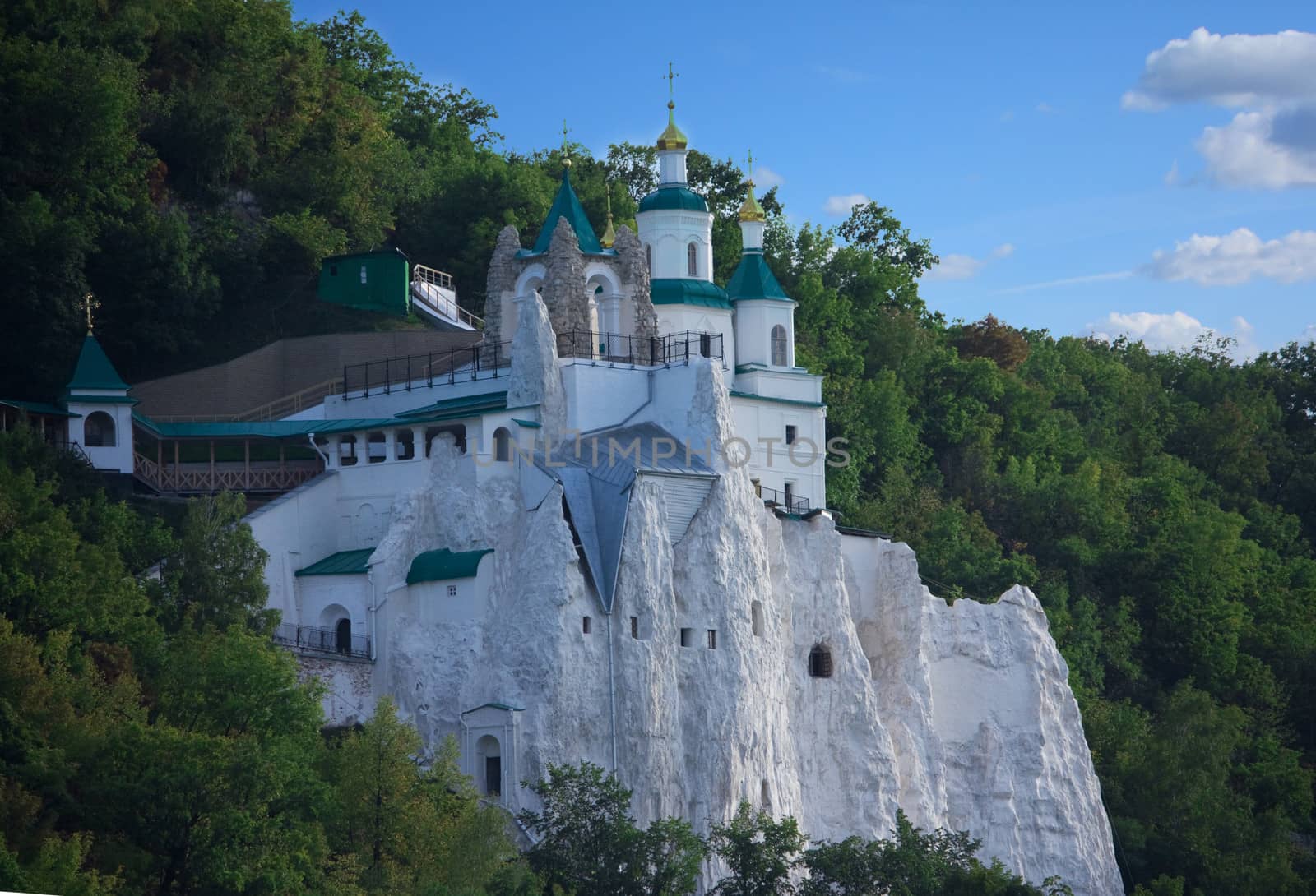 Church on a hill among trees