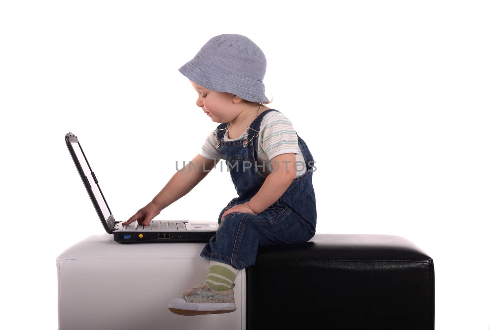 Little boy with a laptop by dedmorozz