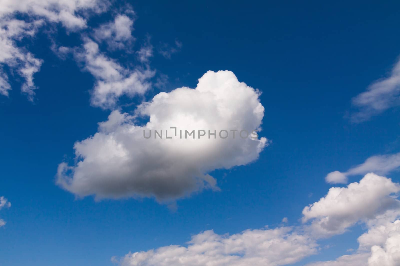 Blue summer sky with white clouds