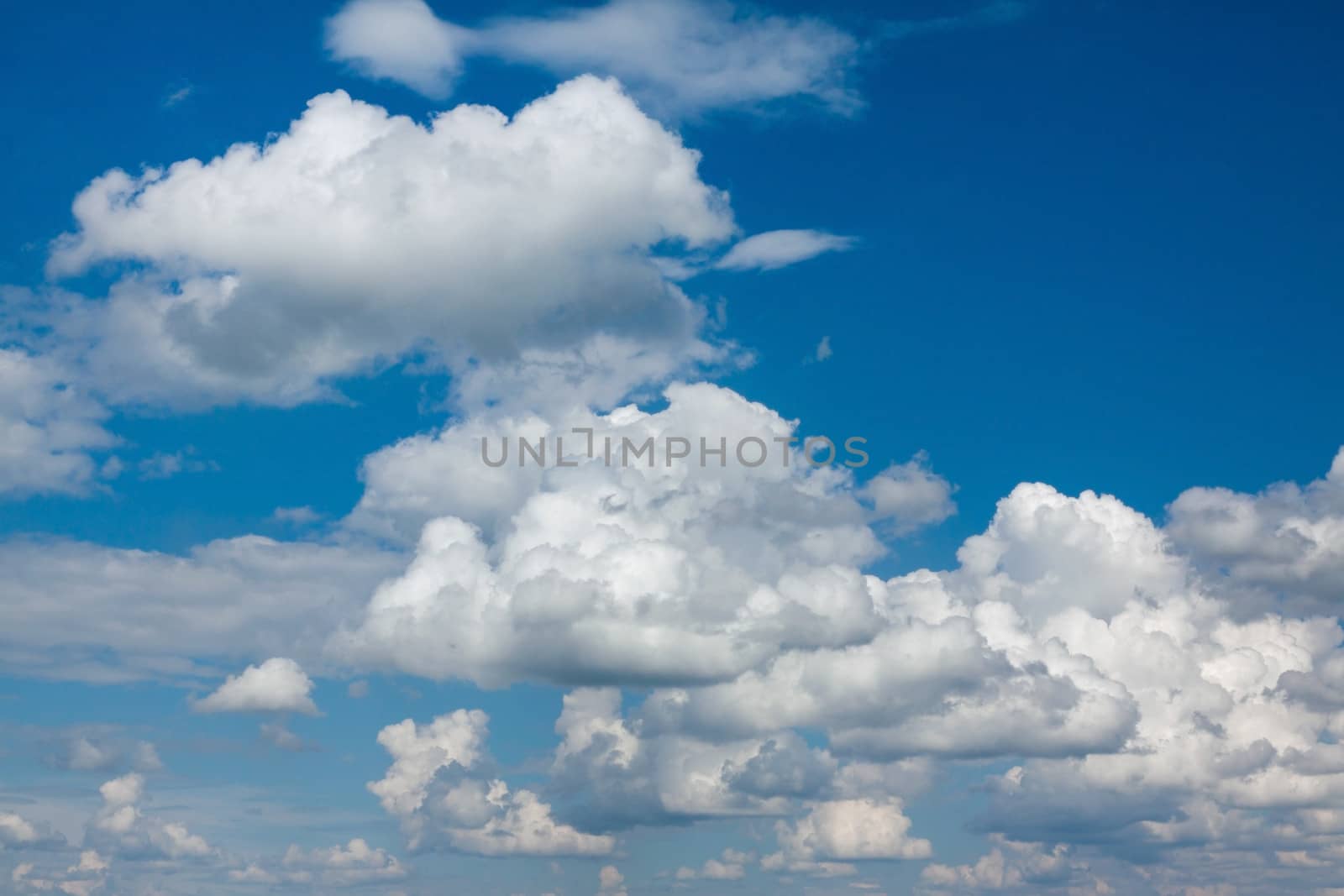 Blue summer sky with white clouds