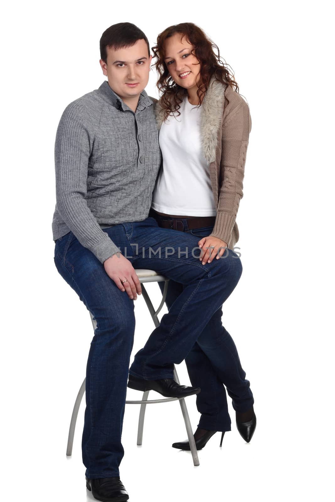 Young Lovely couple isolated on the white background