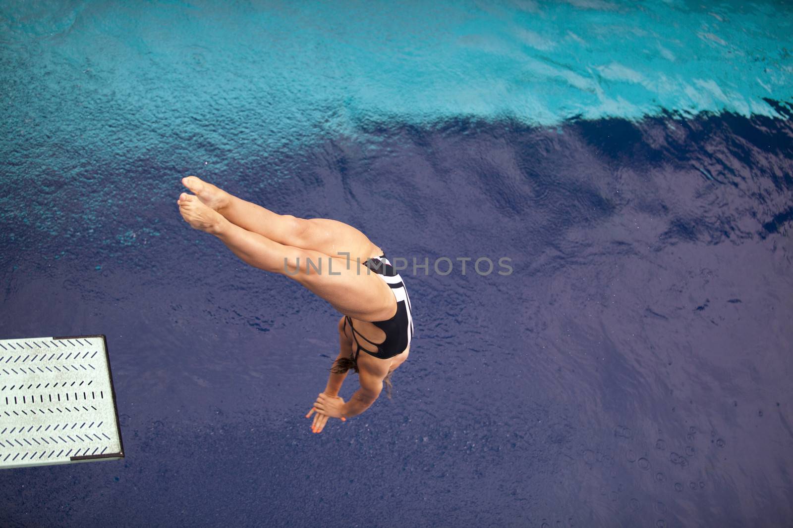 Girl diving into the pool