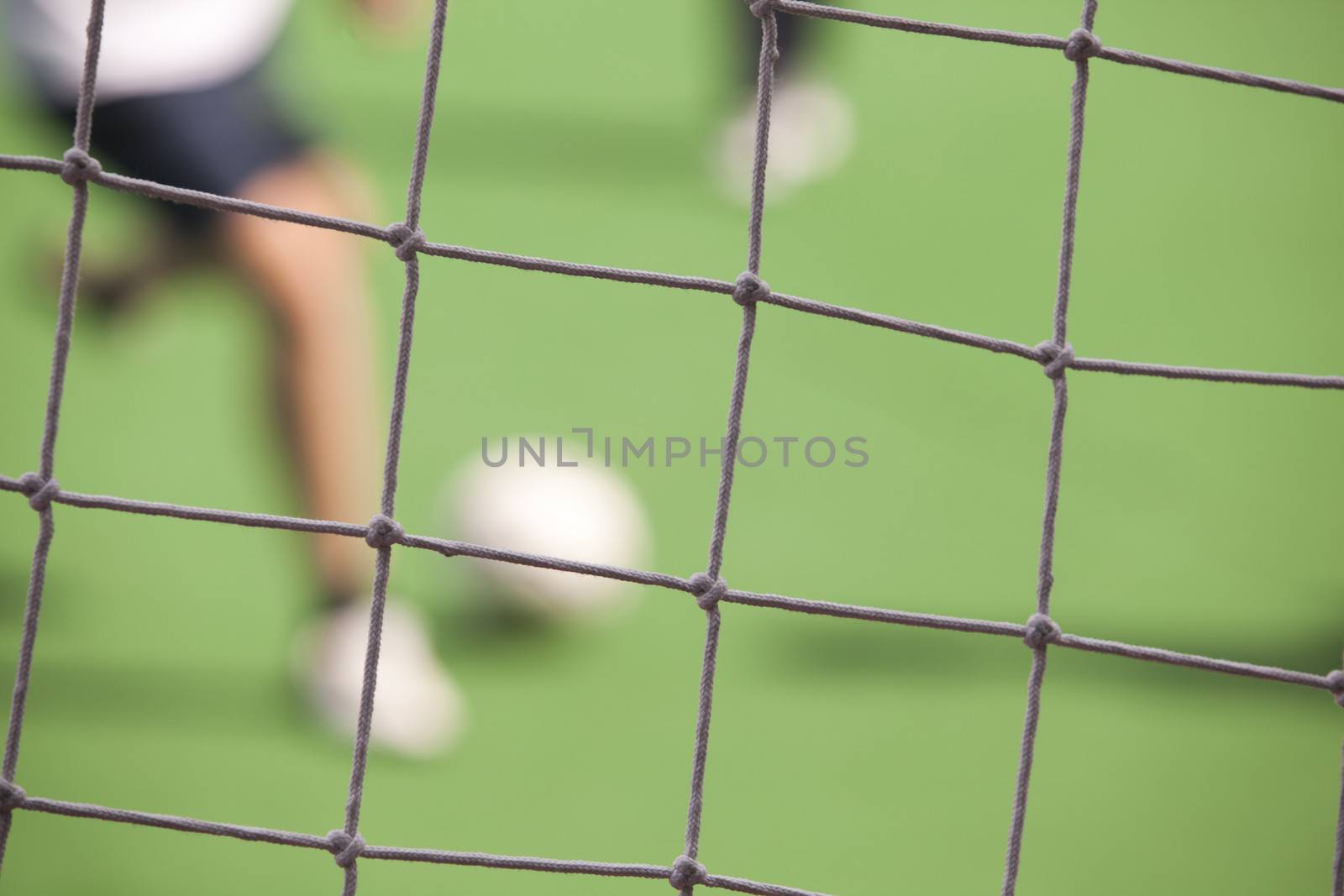 Soccer player running with ball