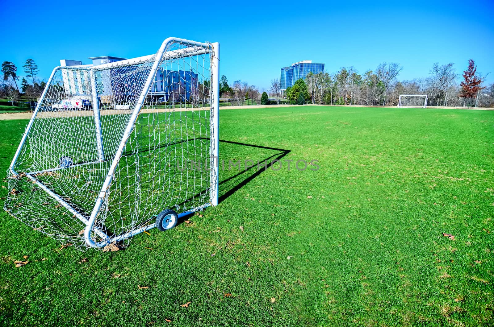 soccer field on a sunny day in a Public Park by digidreamgrafix