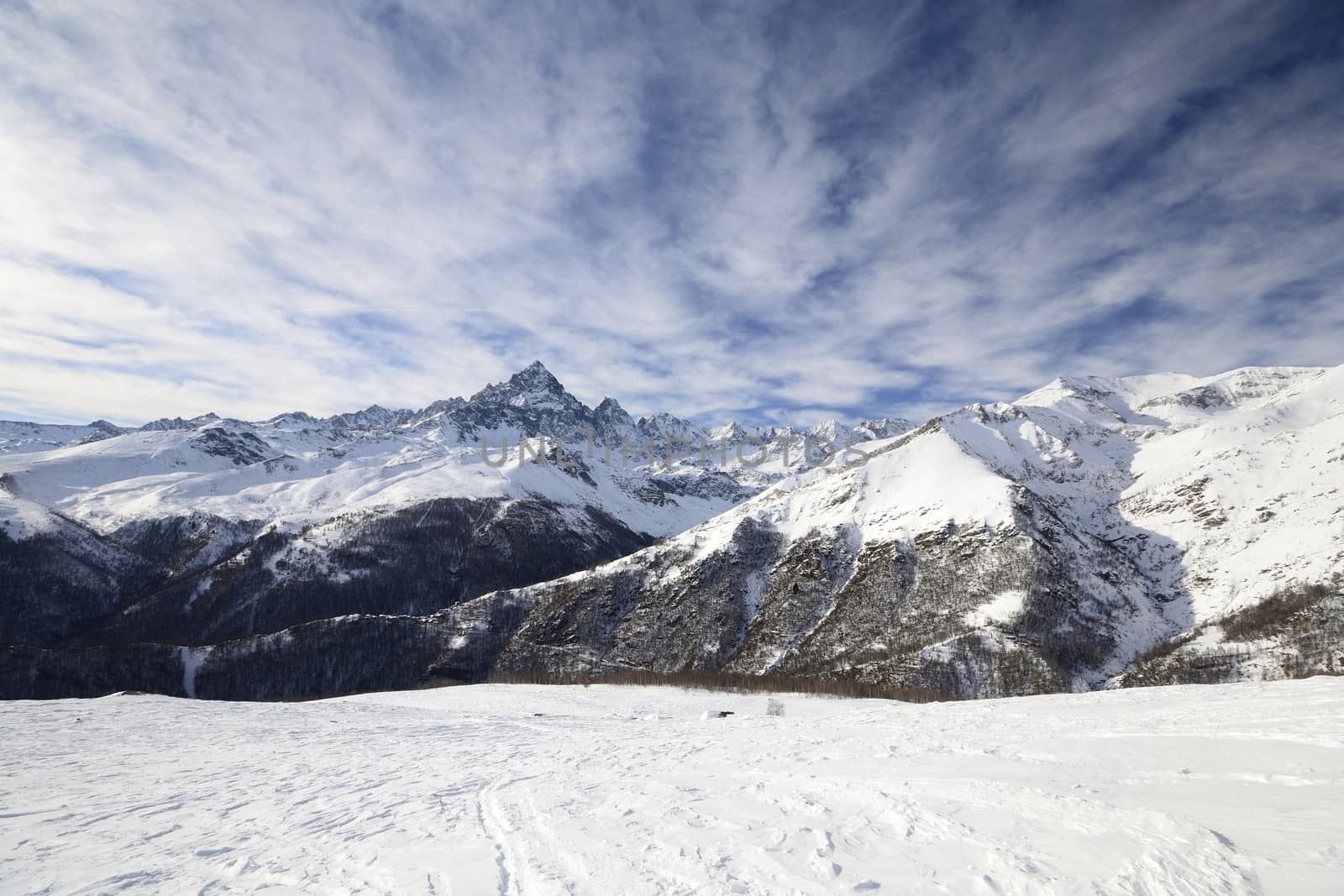 Winter mountainscape and superb frontal view on the majestic M. Viso (3841 m), Po Valley, Piedmont