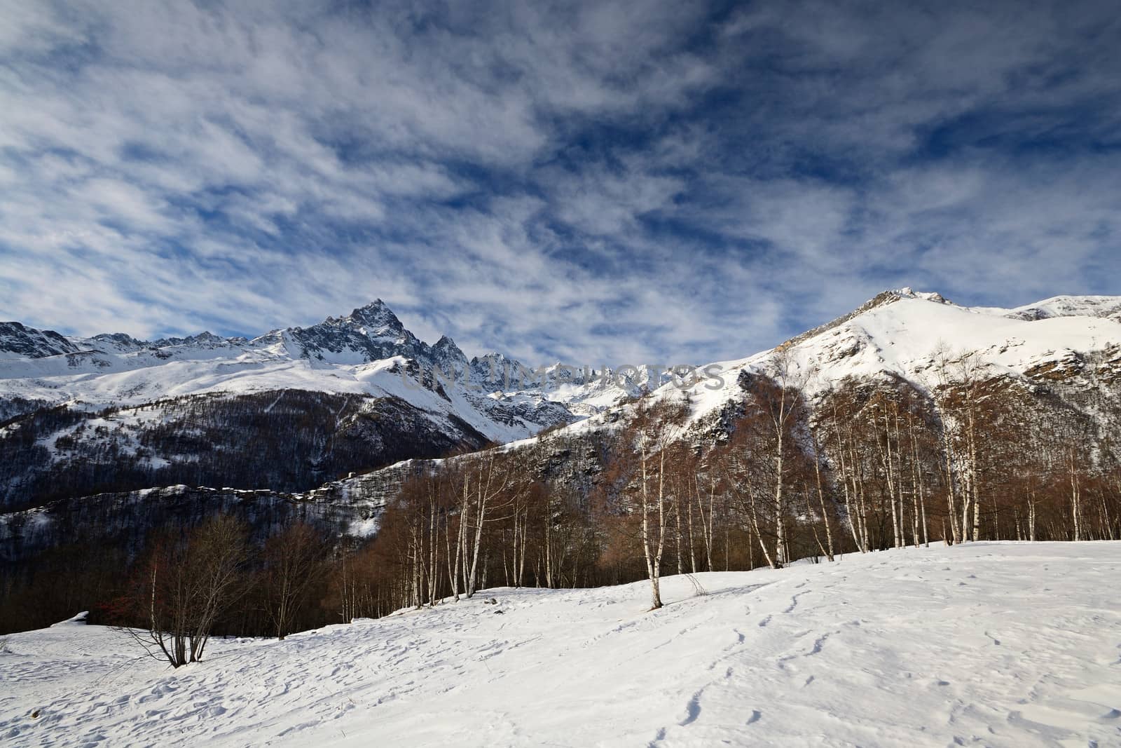 Winter mountainscape and superb frontal view on the majestic M. Viso (3841 m), Po Valley, Piedmont