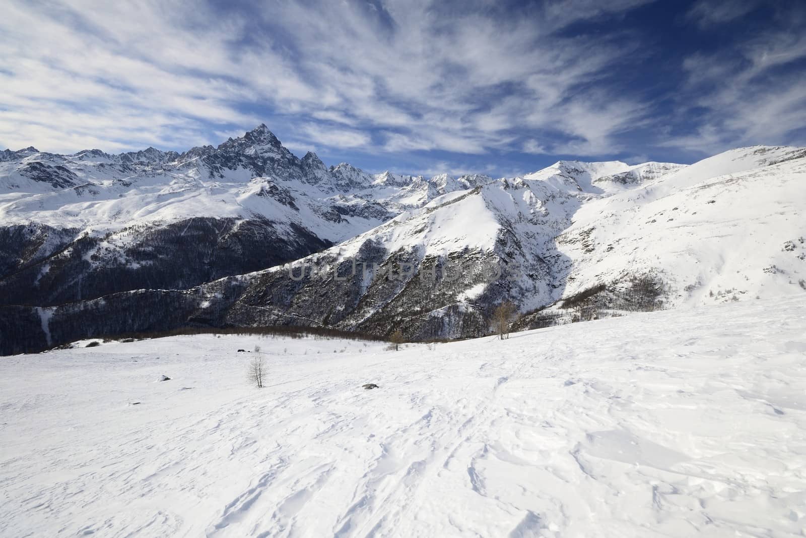 Winter mountainscape and superb frontal view on the majestic M. Viso (3841 m), Po Valley, Piedmont