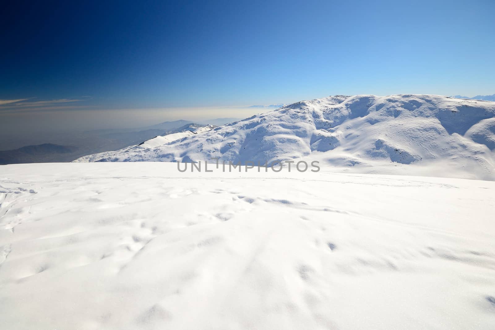 Winter mountainscape and superb frontal view on the majestic M. Viso (3841 m), Po Valley, Piedmont