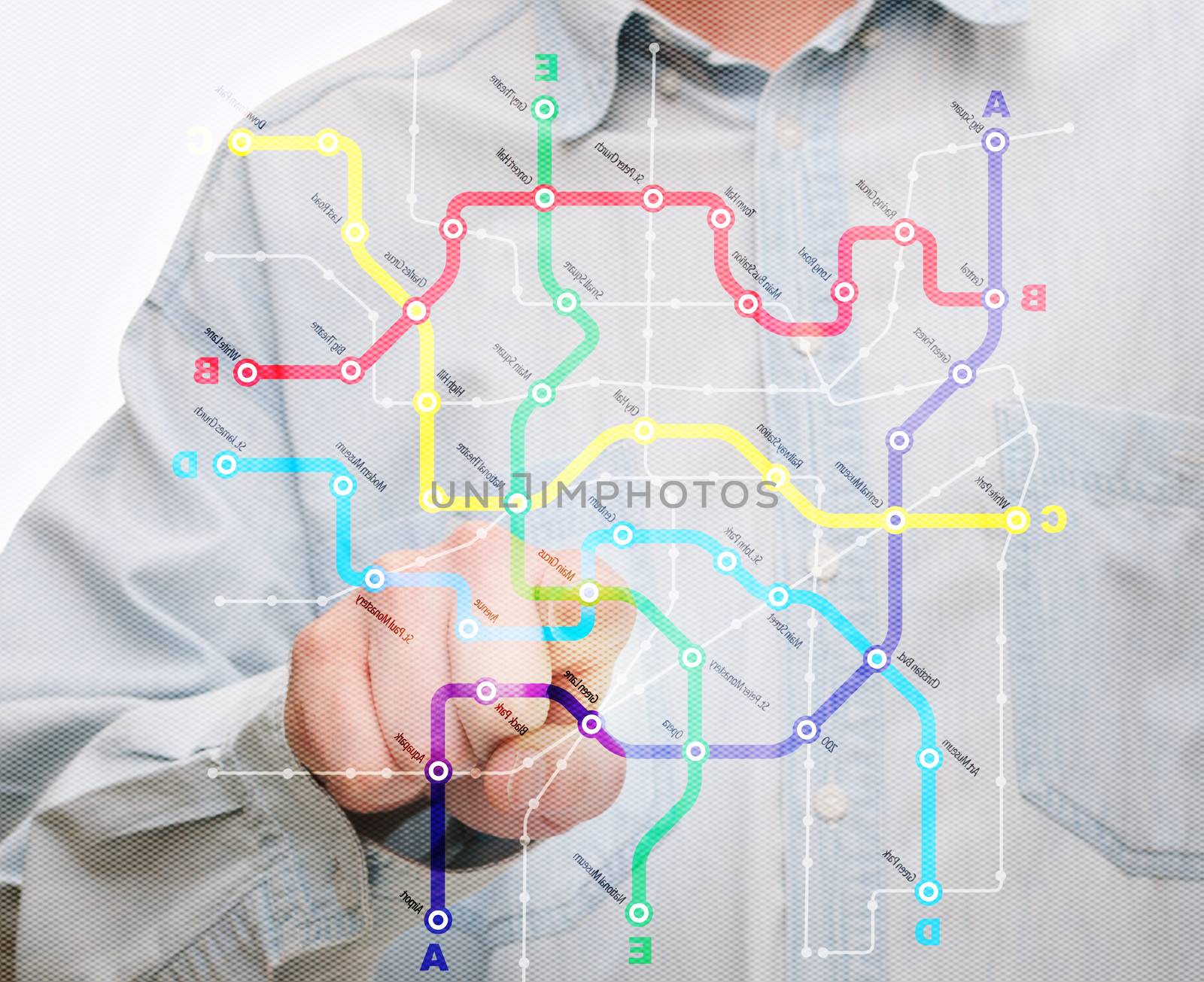 Man's Hand Pushing City Transport Map on Touch Screen