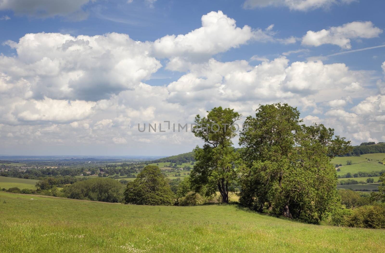 Looking over the rolling hills towards the Cotswold town of Winchcombe near Cheltenham, Gloucestershire, England.