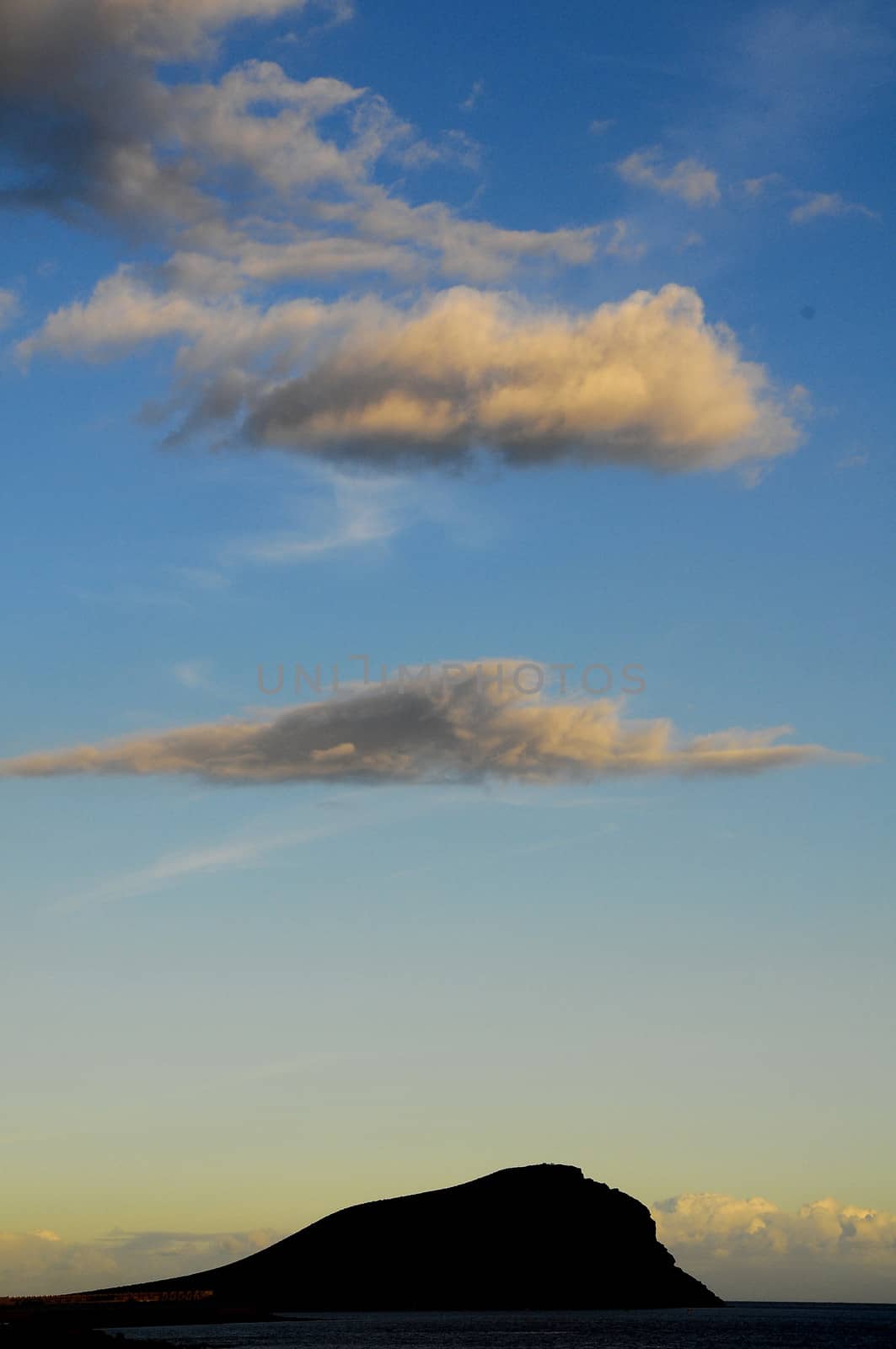 Cloudscape, Colored Clouds at Sunset near the Ocean