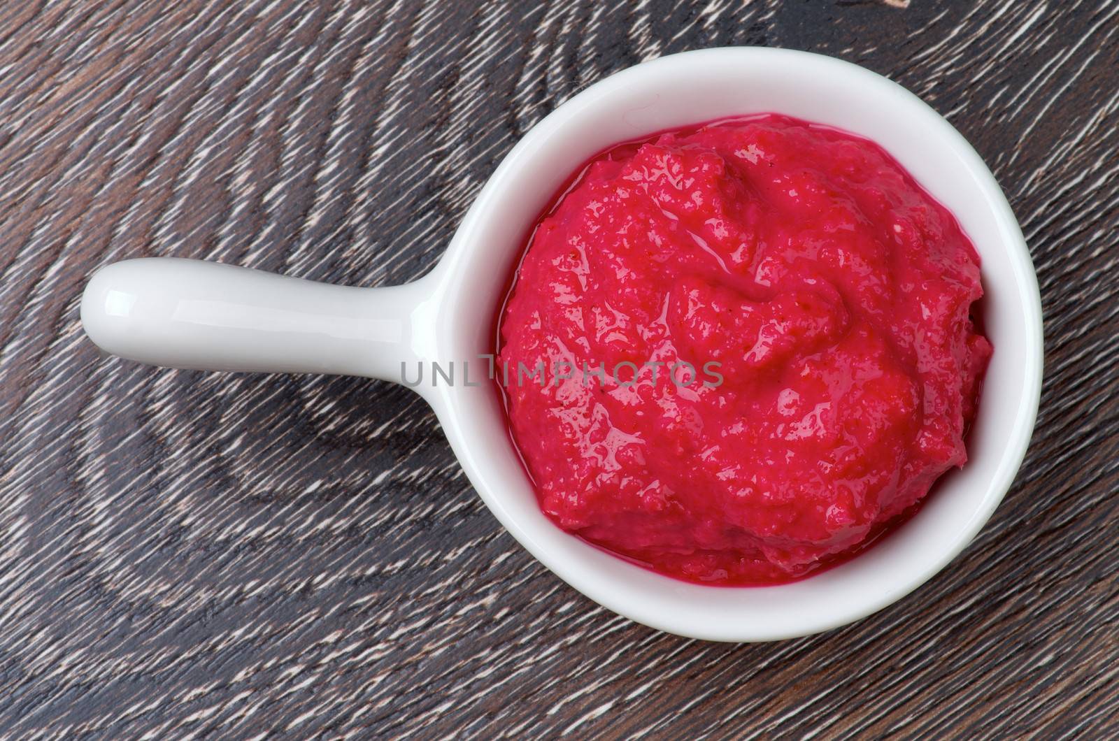Delicious Beet Horseradish in White Sauce Gravy isolated on Wooden background. Top View