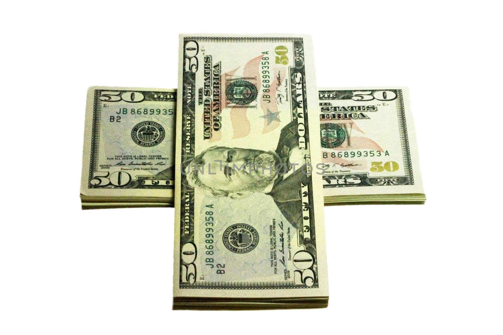 Stacks of paper dollars USA on the white background